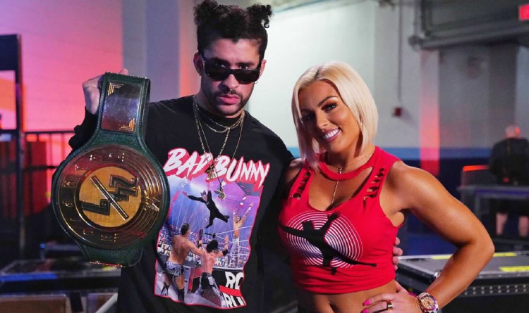 Mandy Rose and Bad Bunny holding the 24/7 belt