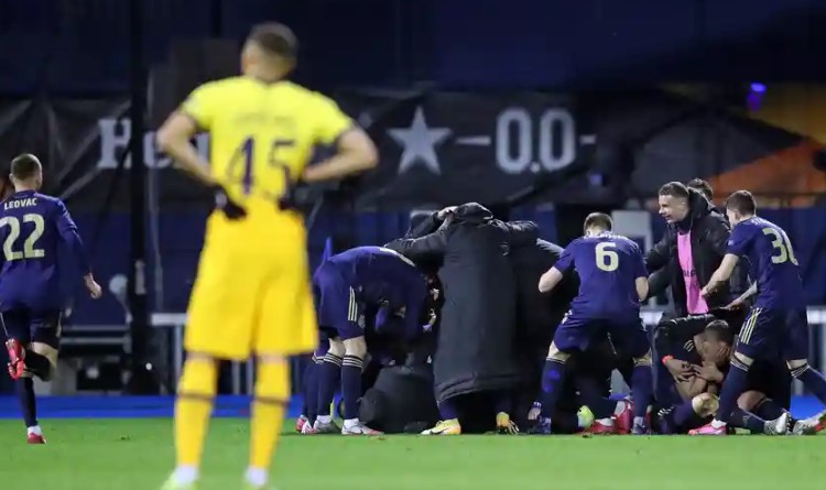 Dinamo Zagreb players celebrating getting to the next Europa League round