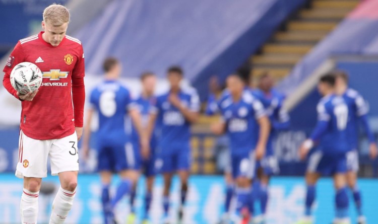 Leicester players celebrating their third goal