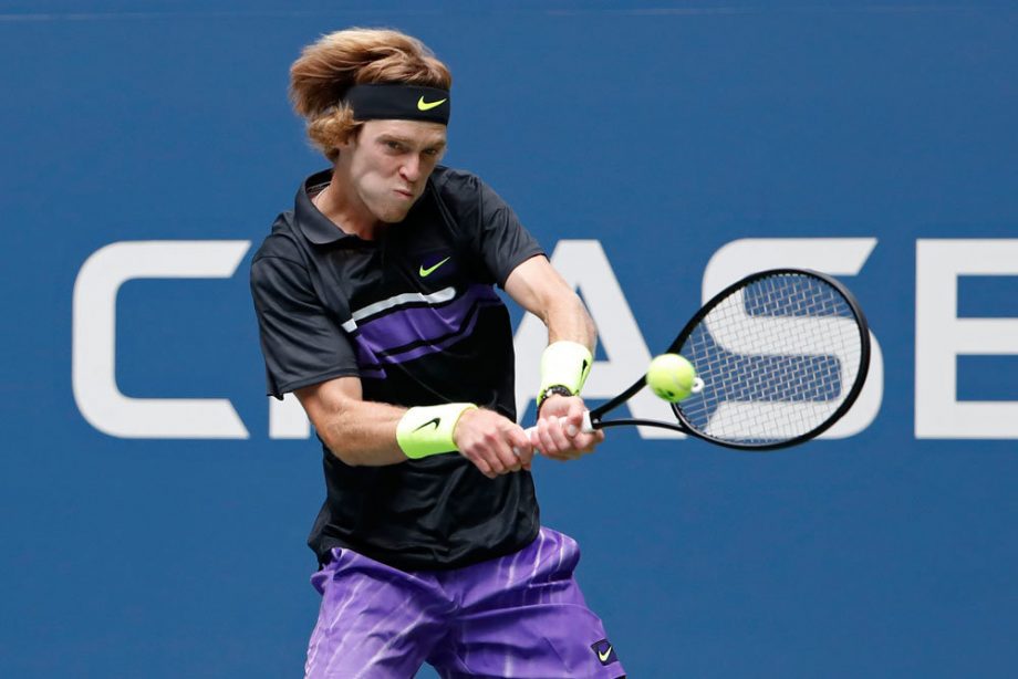 Andrei Rublev with an unbranded racket with a black frame